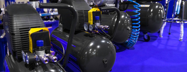 Many Air compressors pressure pumps closeup photo Many Air compressors pressure pumps closeup photo