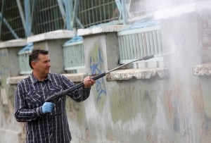 cleaning wall without eye protection