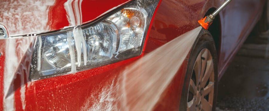 Pressure washing a car