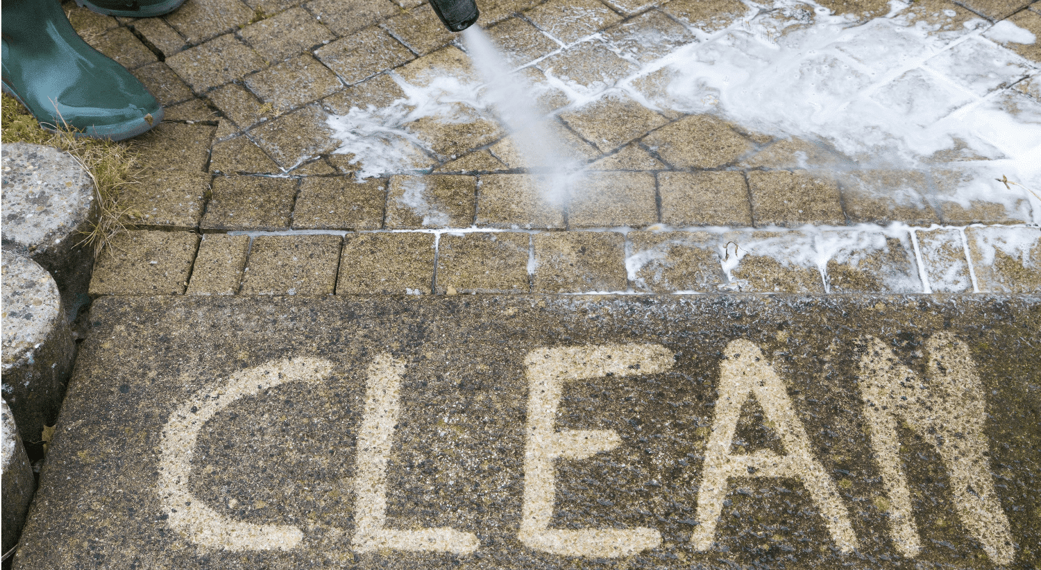 Clean concrete with pressure washer